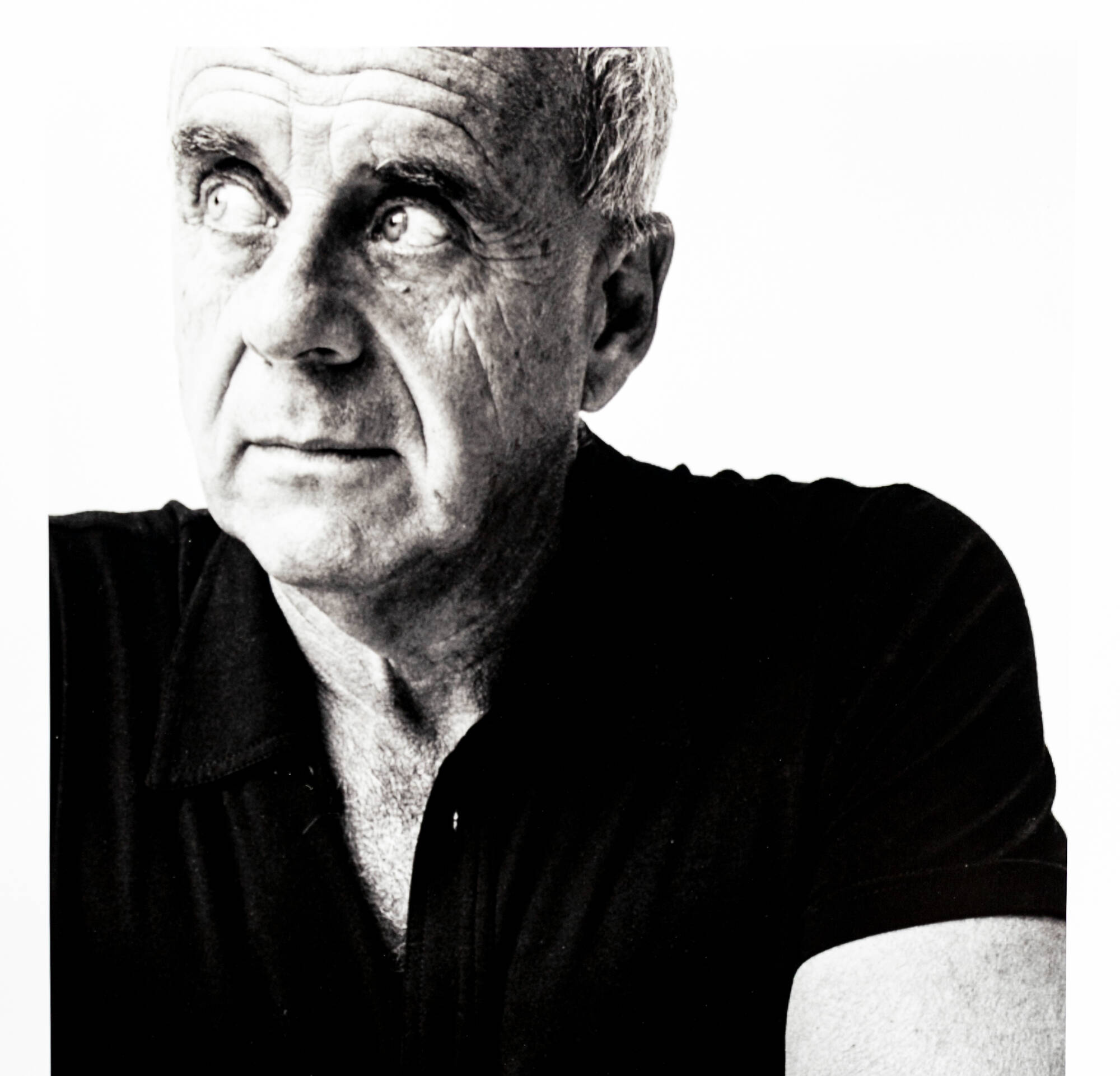 Black and white photograph of photographer Ralph Gibson.